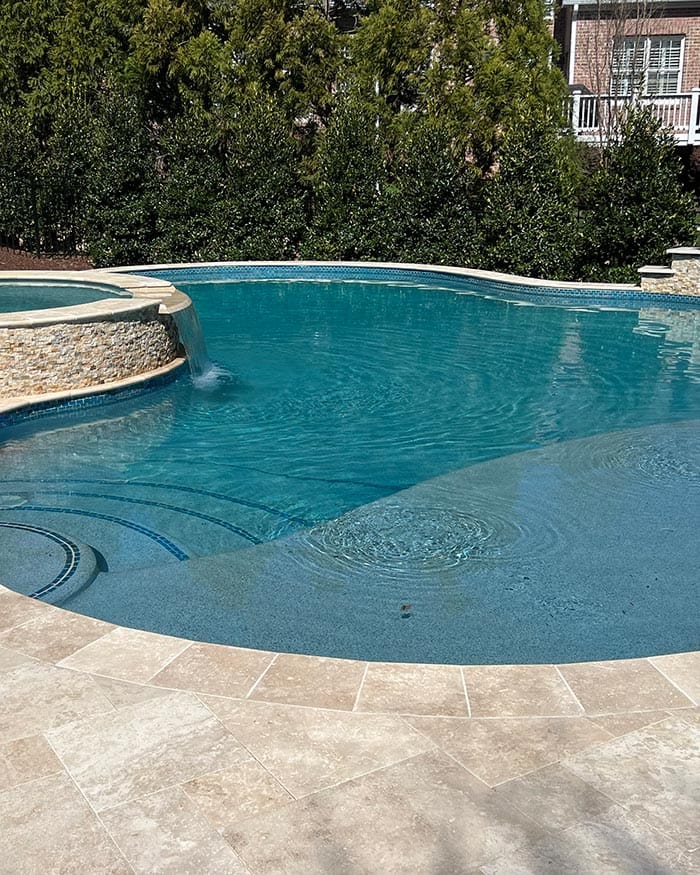 a freeform concrete pool