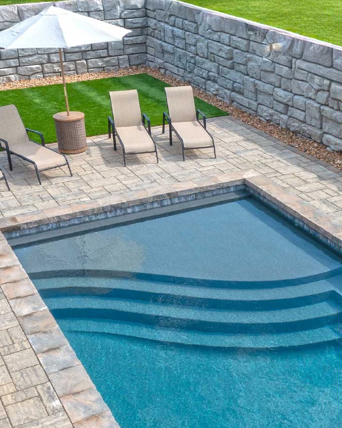 a rectangular fiberglass pool