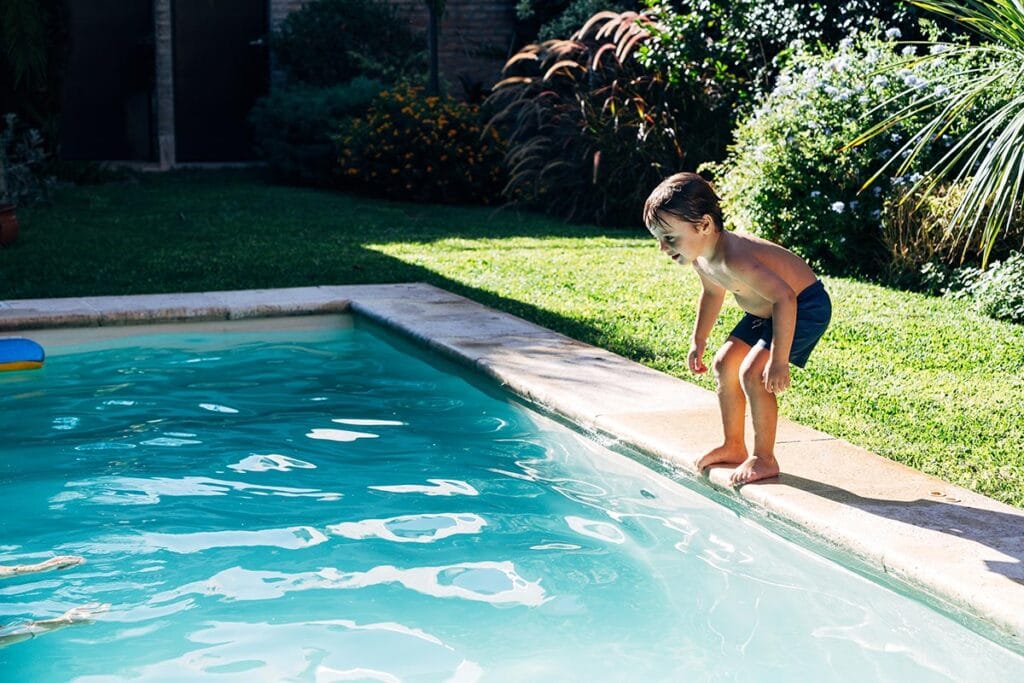 a child about to jump in the pool